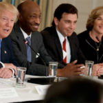 Record - President Donald Trump, left, talks the White House with manufacturing executives on the Feb. 23, 2017.
