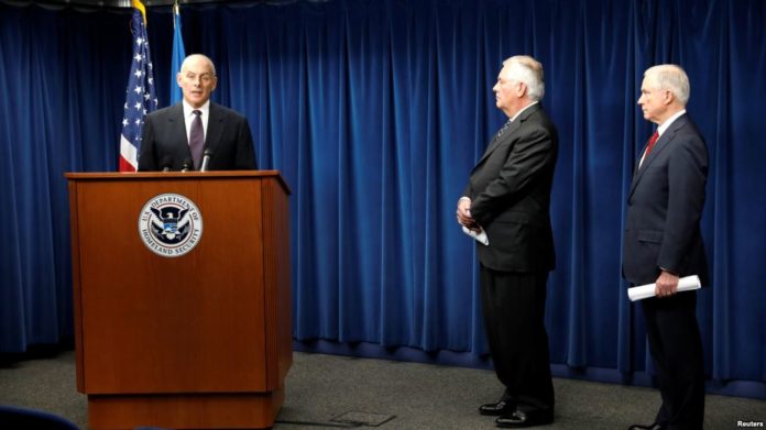trumpSigns Homeland Security Secretary John Kelly (L), Secretary of State Rex Tillerson (C) and Attorney General Jeff Sessions (R), convey comments on issues related to visas