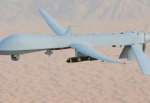 Two drones were shot down over an Iraqi airbase housing US troops and Iraqi and coalition forces on Sunday, the Iraqi military said in a statement